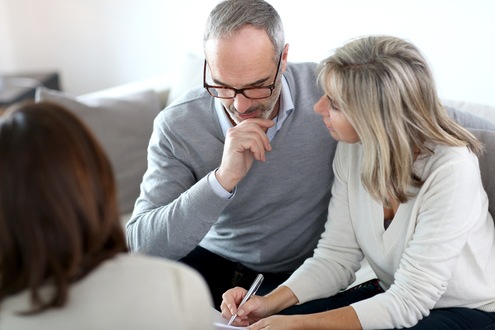 Senior,Couple,Meeting,Financial,Adviser,For,Investment